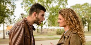 A couple with upset expressions appear to be arguing in a park. Contact a couples therapist in Saint Petersburg, FL for support with marriage counseling in Tampa, FL. 33609 | 33703