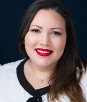 Katia Arroyo-Carrion smiles for a headshot. She is an online marriage counselor in Tampa Bay, FL. Learn more about online couples therapy and marriage counseling in Florida by contacting an online couples counselor in Tampa Bay, FL. 33609 | 33607 | 33629