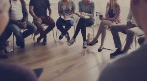 A group of people sit in a circle while listening to someone talking. Learn how group therapy in Tampa, FL can offer support by contacting a group therapist in Tampa, FL. They can help you address mental health concerns in a grief support group in Tampa, FL, and more. 