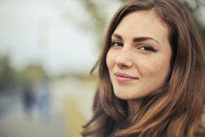 a young woman with a half smile looking at the camera, therapy in st petersburg fl, substance abuse counseling